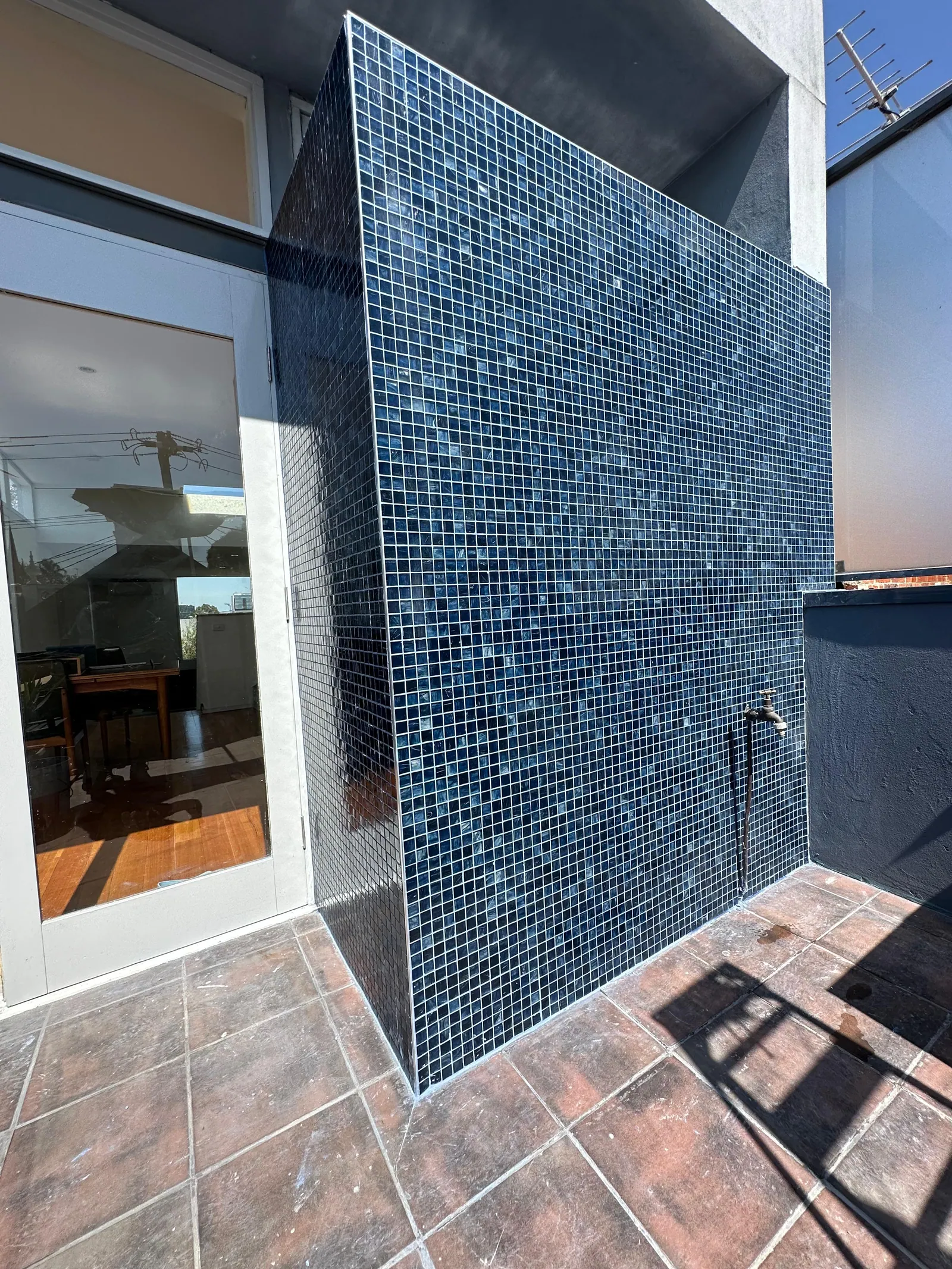 Completed exterior mosaic feature wall