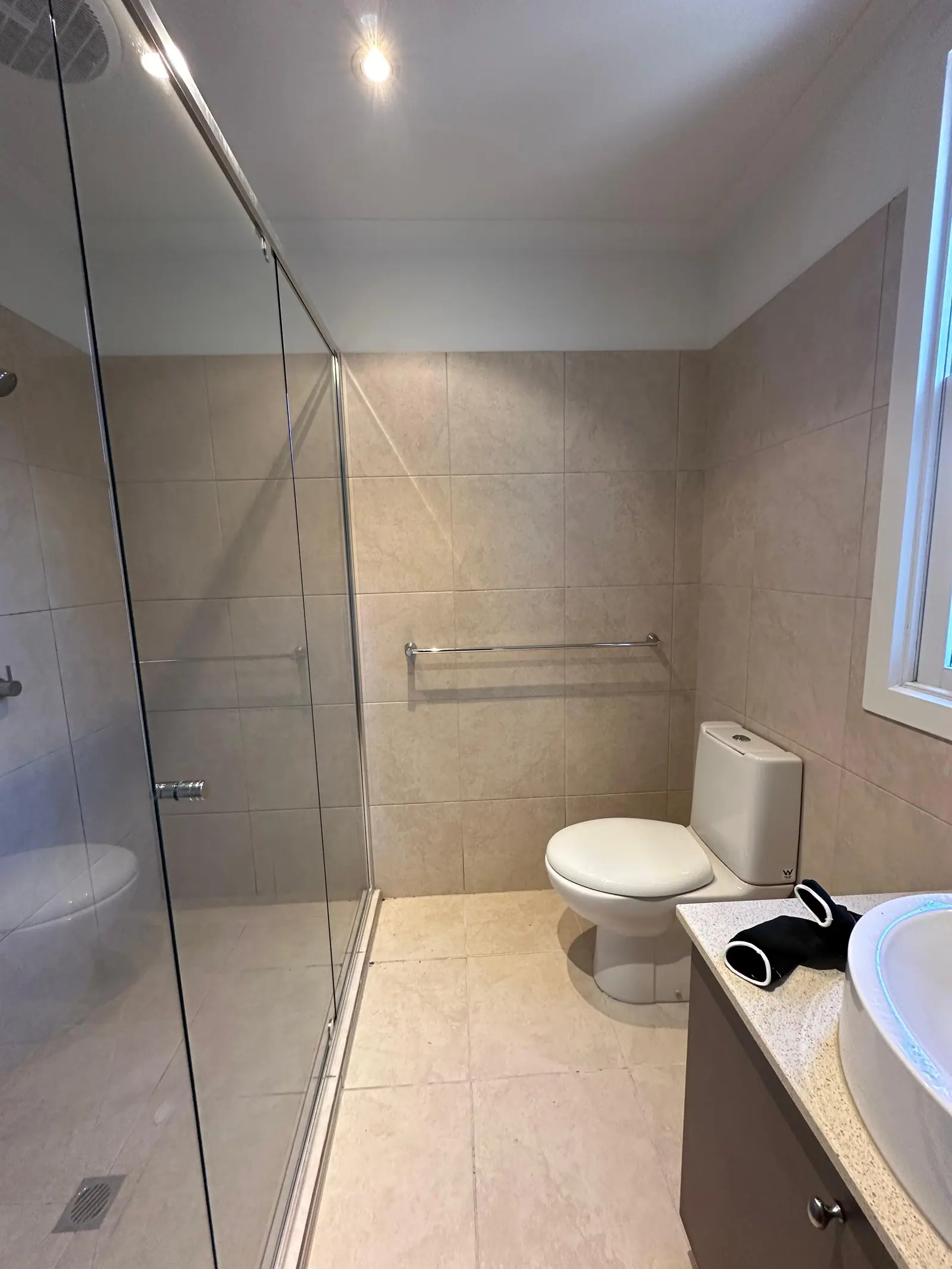 Dated bathroom before work began, photographed from the doorway
