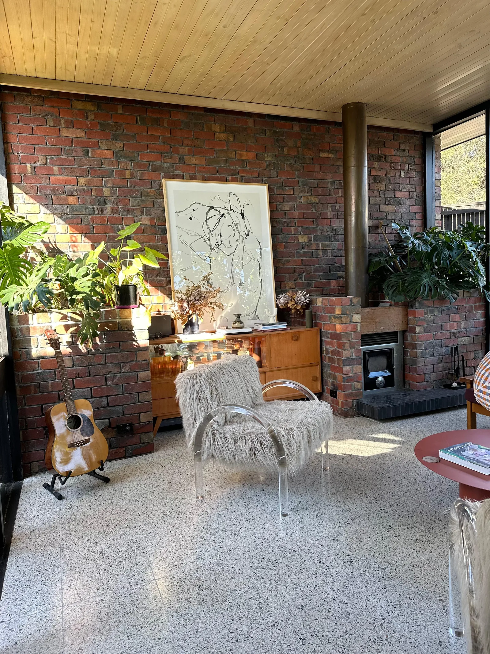Completed terrazzo floor across a furnished living area
