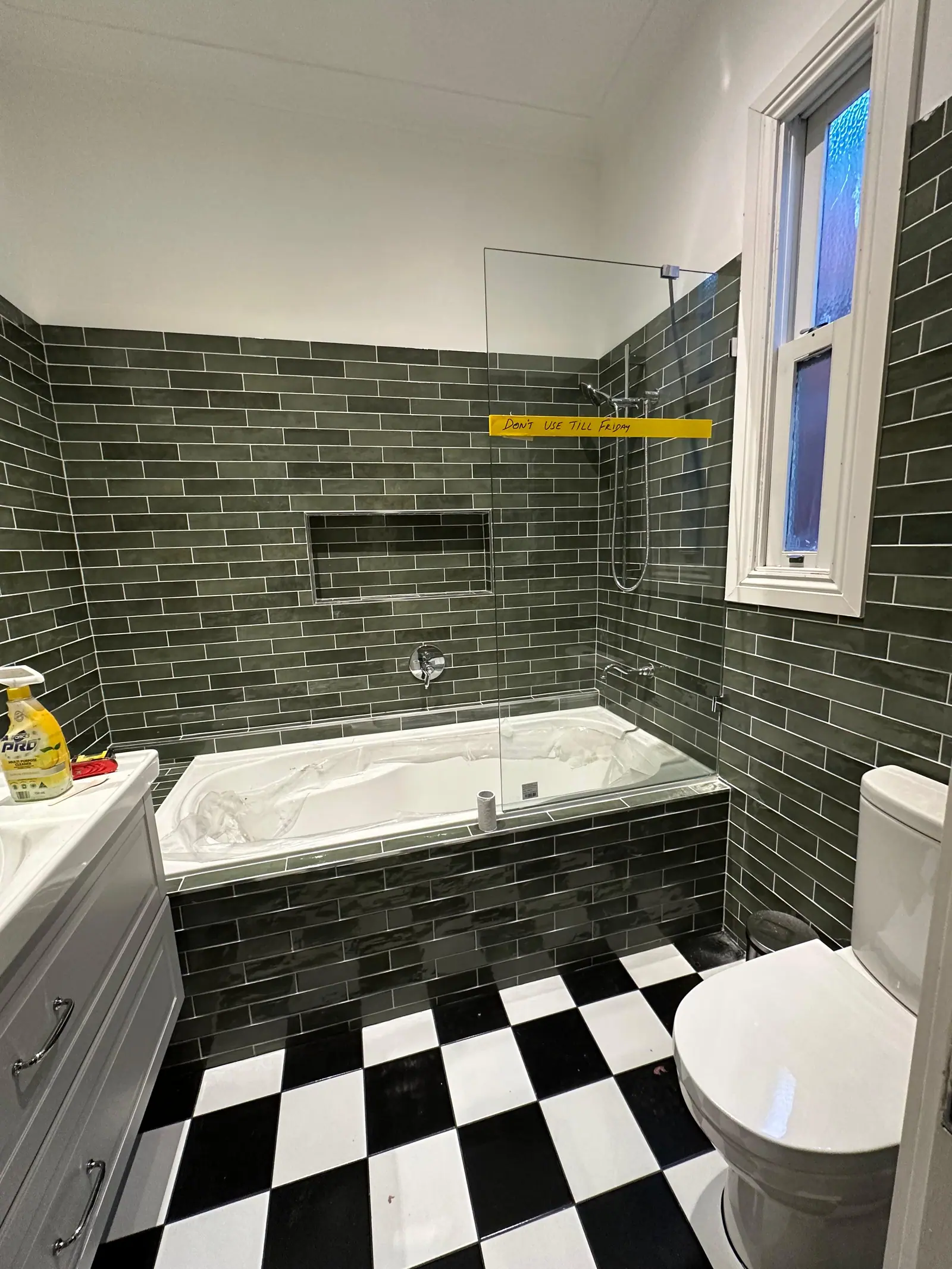 Second view of the completed bathroom, tiled floor to wall